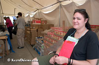 Volunteer Rebecca Guenzel from Philadelphia, PA checks IDs to make sure only local residents receive donated merchandise at the Free Store at Emergency Communities in St. Bernard Parish, LA. Emergency Communities was formed after Hurricane Katrina to fill some of the service gaps left by traditional disaster response agencies. Emergency Communities set up a community kitchen, distribution center and volunteer encampment in St. Bernard Parrish near the border with Orleans Parish. In June, Emergency Communities will move their operation down to Violet, about 6 miles away.